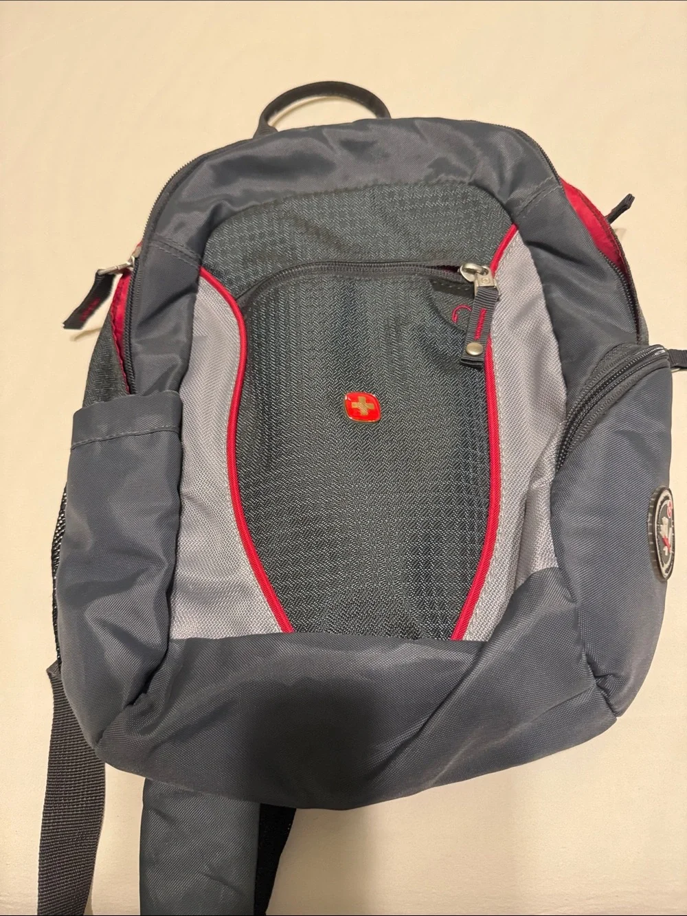 SwissGear Gray and Red Men’s Backpack with Multiple Compartments
